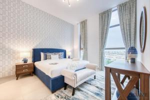 Postel nebo postele na pokoji v ubytování Fresh 2BR at Mudon Views 4 Dubailand by Deluxe Holiday Homes + 20 fotografií