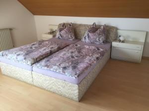 Postel nebo postele na pokoji v ubytování Ferienwohnung Wiesinger
