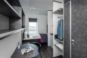 Cabinn Copenhagen客房内的一张或多张床位