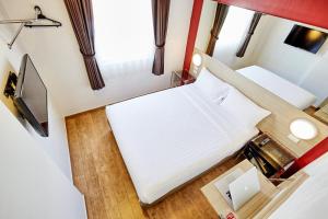 Letto o letti in una camera di Red Planet Bangkok Asoke - SHA Extra Plus