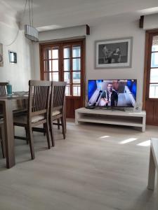 A television and/or entertainment centre at EL RINCON DE LUZ