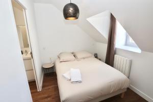Postel nebo postele na pokoji v ubytování Napoléon Gare 8 T2 Dernier Etage ByLocly