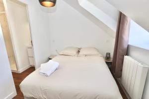 Postel nebo postele na pokoji v ubytování Napoléon Gare 8 T2 Dernier Etage ByLocly