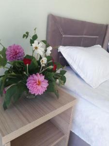 En eller flere senger på et rom på Guest House Mari30