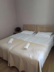En eller flere senger på et rom på Guest House Mari30