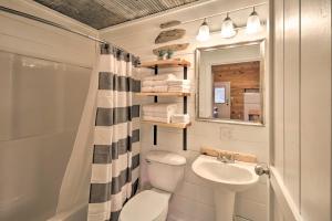 a bathroom with a sink and a toilet and a shower at Updated Mtn View Studio with Loft - Near River! in Mountain View