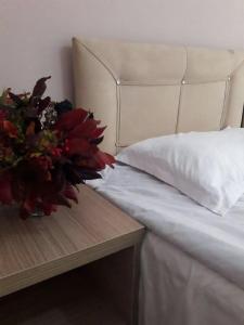 En eller flere senger på et rom på Guest House Mari30