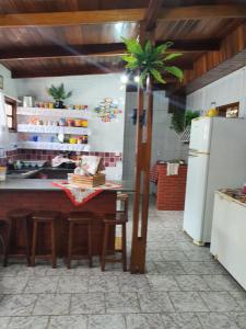 Kuchyň nebo kuchyňský kout v ubytování Casa de praia com piscina Bertioga + 8 fotografií