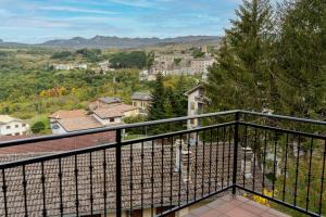 a balcony with a view of a city at Hotel Terrazzo d'Abruzzo in Palena