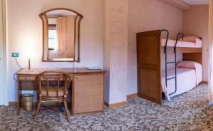 A bed or beds in a room at Hotel Terrazzo d'Abruzzo