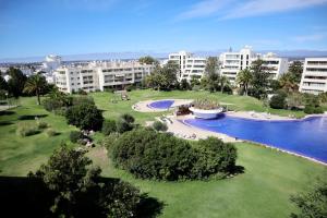 an aerial view of a resort with a large swimming pool at Pôr-do-Sol Alvor in Alvor