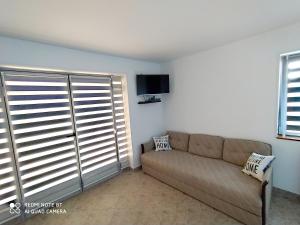Χώρος καθιστικού στο Indigo Forest Rooms