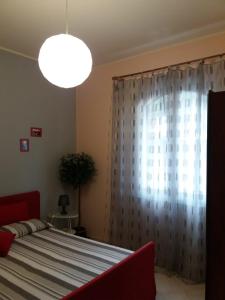 Posteľ alebo postele v izbe v ubytovaní Casa di Laura a 50 mt dal mare