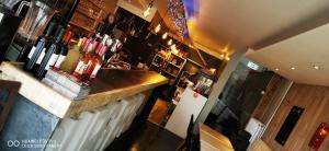 an overhead view of a bar in a restaurant at La Pierre du Diable in Stavelot