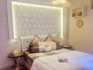 Letto o letti in una camera di Riad Green Vines