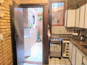 Køkken eller tekøkken på Apartamento/Duplex Praia do Francês