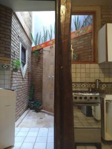 Køkken eller tekøkken på Apartamento/Duplex Praia do Francês + 6 billeder