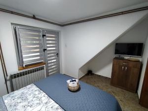 Ένα ή περισσότερα κρεβάτια σε δωμάτιο στο Indigo Forest Rooms