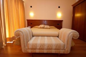 Posteľ alebo postele v izbe v ubytovaní Hotel Panoramic Montepulciano