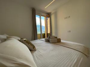 Cama ou camas em um quarto em B&B Am Gardasee blick
