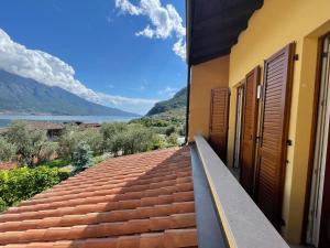 a balcony of a house with a view of the water at B&B Am Gardasee blick in Limone sul Garda
