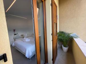Posteľ alebo postele v izbe v ubytovaní B&B Am Gardasee blick