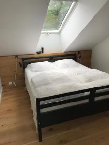 Llit o llits en una habitació de Skippergaarden