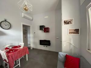 TV a/nebo společenská místnost v ubytování DIMORA ARMONIA