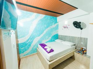 Postel nebo postele na pokoji v ubytování Hotel Jireh - San Carlos Ant