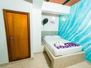 Postel nebo postele na pokoji v ubytování Hotel Jireh - San Carlos Ant