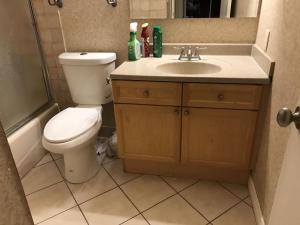 a bathroom with a toilet and a sink at New bedroom queen size bed at Las Vegas for rent-4 in Las Vegas +14 photos