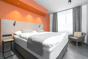 Postel nebo postele na pokoji v ubytování Hotel Diana