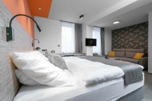 Postel nebo postele na pokoji v ubytování Hotel Diana