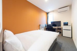 TV a/nebo společenská místnost v ubytování HOTEL R9 The Yard Hitachinaka + 16 fotografií