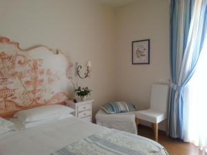 Postel nebo postele na pokoji v ubytování B&B Corte Frisonai