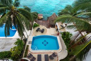 an aerial view of a resort with a swimming pool at Villa Paula Cozumel in Cozumel