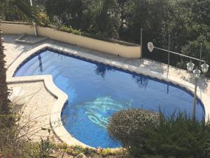 Vista de la piscina de Lloret de Mar apartment to rent with seaview (UP) for max 4 persons o alrededores