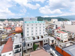 an overhead view of a city with buildings at Chisun Grand Takayama in Takayama