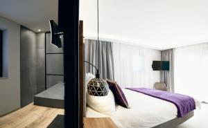 Posteľ alebo postele v izbe v ubytovaní Chalet Amadeus