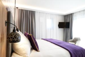 Posteľ alebo postele v izbe v ubytovaní Chalet Amadeus