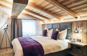 Posteľ alebo postele v izbe v ubytovaní Chalet Amadeus