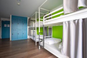 Cama o camas de una habitación en Nyon Hostel