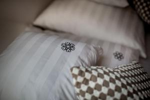 Posteľ alebo postele v izbe v ubytovaní Harenda Residence - Destigo Hotels