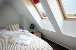 Posteľ alebo postele v izbe v ubytovaní Harenda Residence - Destigo Hotels