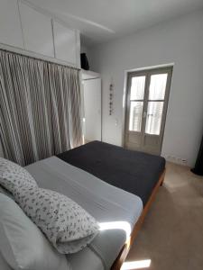 Postel nebo postele na pokoji v ubytování Chora Elegant Traditional House