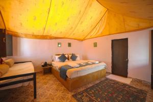 Postel nebo postele na pokoji v ubytování Sultan Resort