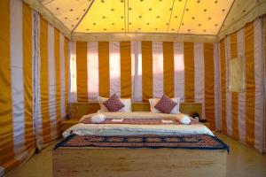 Postel nebo postele na pokoji v ubytování Sultan Resort
