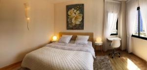Posteľ alebo postele v izbe v ubytovaní Apartment VIParaiso