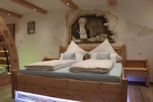 Tempat tidur dalam kamar di Vils-Residenz