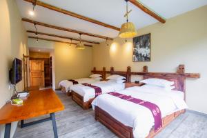 Galería fotográfica de Jiaju Legend Homestay en Danba